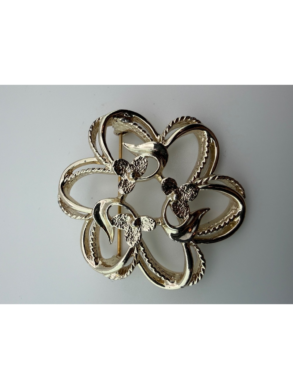 Silver tone flower brooch